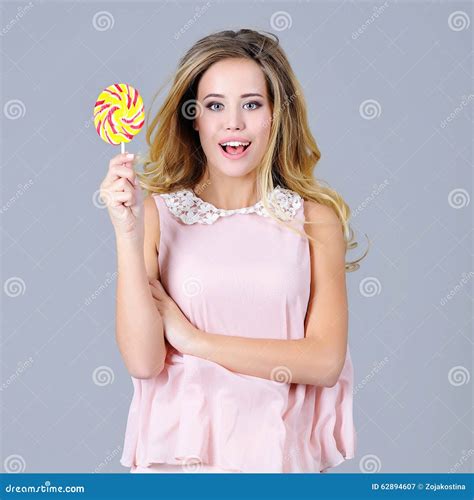 Beautiful Young Woman Having Fun With A Candy Stock Image Image Of