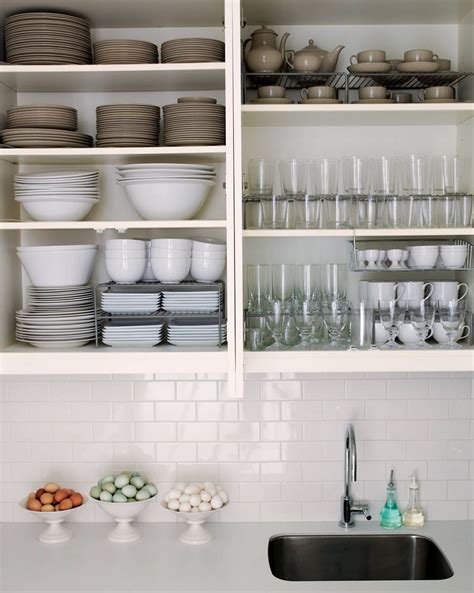 Here's you can organize your kitchen cabinets and drawers this is why you want all of your cabinets and drawers open so you can see how it will flow before putting everything back in there. How to organize kitchen cabinets and drawers with large ...