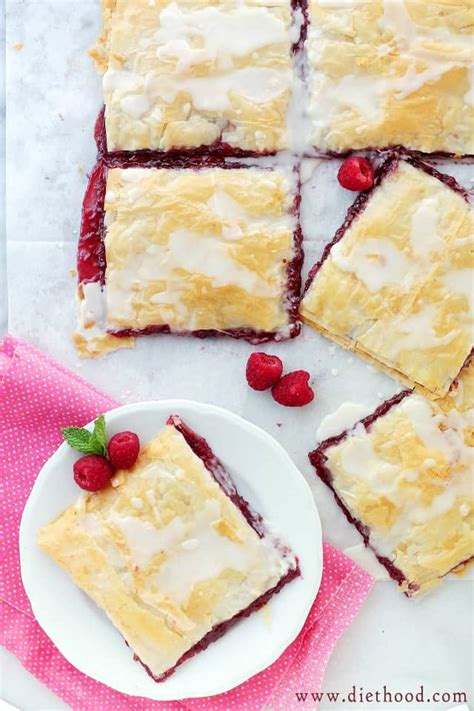Phyllo dough doesn't puff when it bakes—it crisps. Phyllo Raspberry Pop Tarts with Vanilla Glaze Recipe | Diethood
