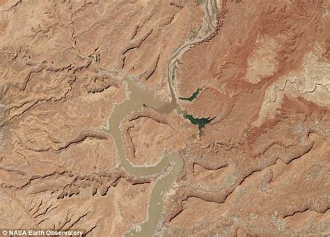 Satellite Images Capture Mud Choked Half Full Lake Powell In The Grip