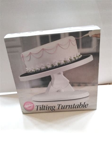 Wiltons Tilt N Turn Turntable Cake Decorating Stand White Three Angles