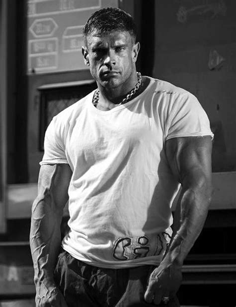 Muscular Hunk With Vascular Arms In Tight White Tee Shirt A Photo On