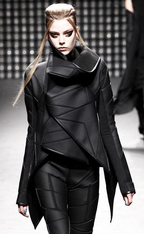 Futuristic Geometric Fashion With Layered Construction And Sculptural