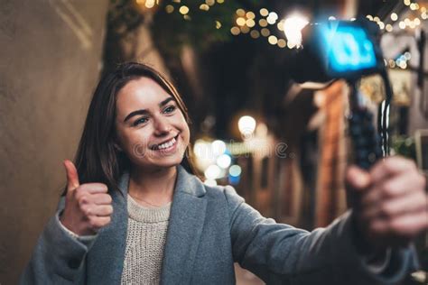 Traveler Female Blogger Shooting Video For Vlog Social Media With Digital Camera Smiling Woman