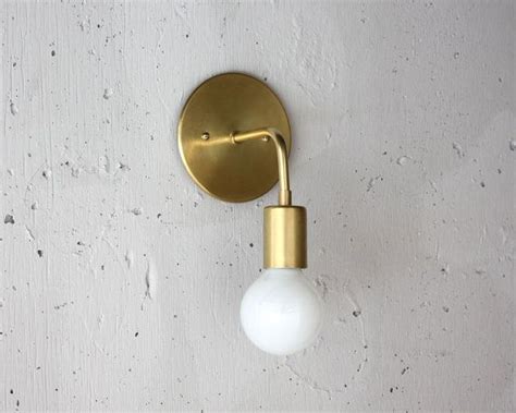 The glossy opal glass dome is surrounded by a matte black metal dome while a gooseneck arm holds the shade and swings from left to right. Modern Brass Sconce - Roy - Simple wall light - Mid ...