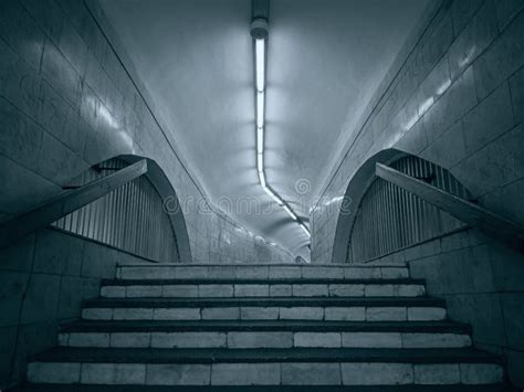 Dark Interior Of Curve Underpass Tunnel On Subway Metro Station With