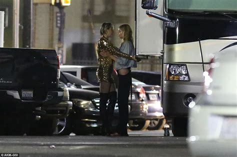 Miley Cyrus Passionately Kisses Victorias Secret Angel Stella Maxwell