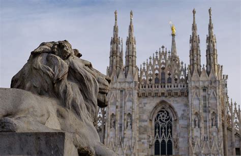 Milan Cathedral With A Statue Of Lion Milan Lombardy Italy