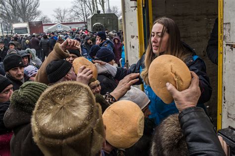 Residents Take Cover As Ukraine Border Battles Reignite Conflict The