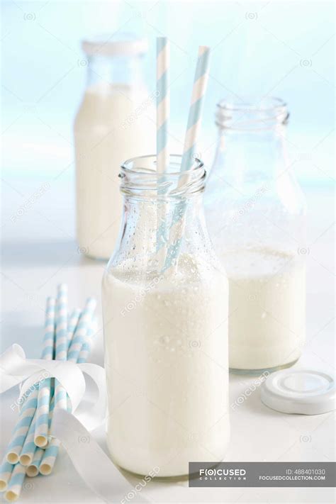 Cold Fresh Milk In Bottles With Straws Dairy Product Milk Bottle Stock Photo