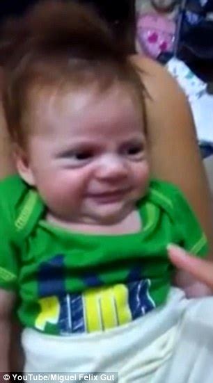 Grumpy Mexican Toddler Refuses To Smile For Parents And Frowns At Them