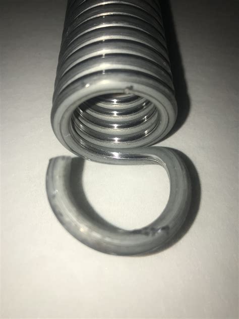 Be sure to wipe excess off of the door so that it does not drip on your car. Compton Short Garage Door Spring 14.7″ body Tension ...