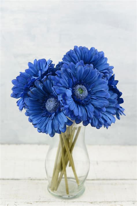 24 blue silk gerbera daisy flowers 9in flower heads 4in across and made of shimmering poly silk