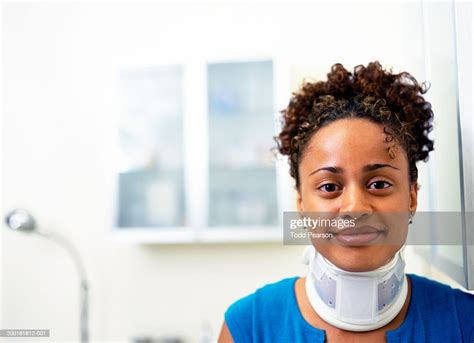 Young Woman Wearing Neck Brace Smiling Portrait High Res Stock Photo