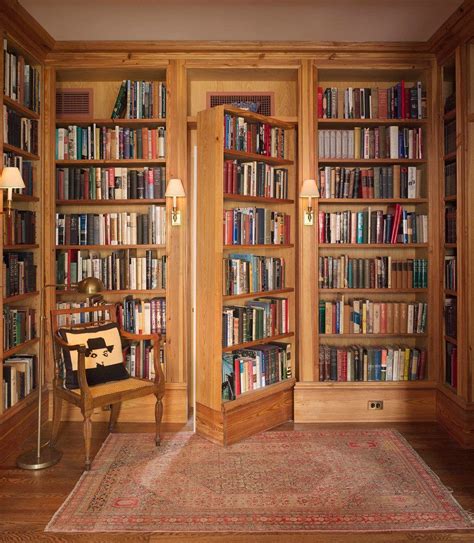 This unique bookcase will provide a warm, retro accent to most of the contemporary living rooms. hidden door bookcase closet family room traditional with ...