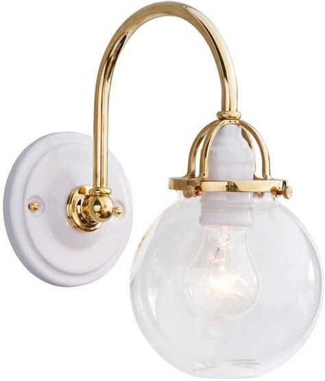 While they may not be the focal point of your bathroom's design, sconces add to the layout of the room and complement other sources of light in the space. Mist Arched Sconce | Rejuvenation | Bathroom sconces ...