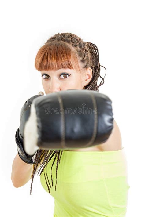Woman Wearing Boxing Gloves Ready To Fight And Punching Or Hitting