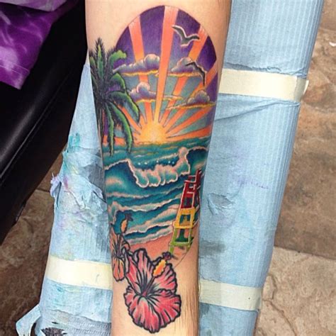 Polynesian tattoos tend to incorporate the sun as a symbol of a new day or rebirth. Fun beach scene tattoo done on the inside of a forearm ...