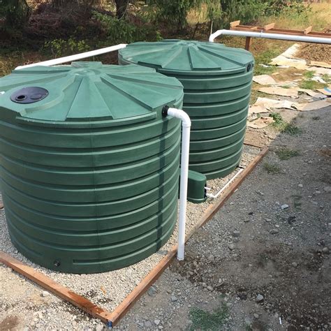 Landscape irrigation rainwater harvesting system using fiberglass underground tank / 12,000 gallons. 2 X 2825 gallon rain water harvesting tanks and pump ...