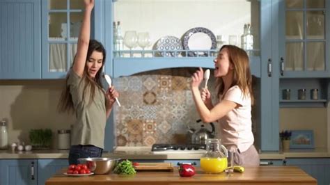 Create Two Girls Dance In The Kitchen Short Video Ad By Socialspider