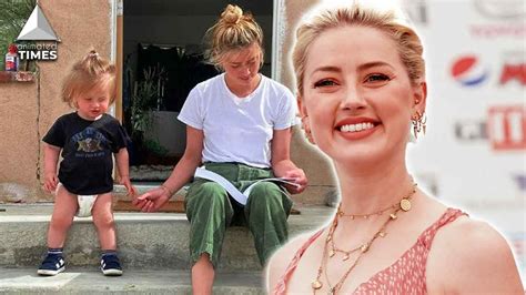 Whats Really In That Stroller Fans Claim Amber Heard Sedates Baby