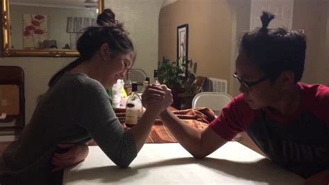 girl beats guy arm wrestling