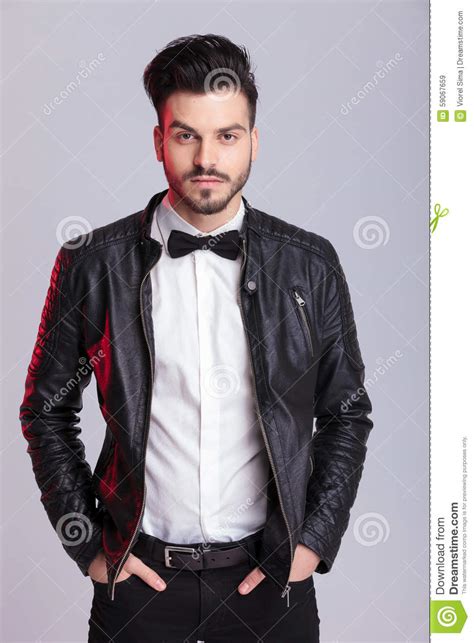 Young Handsome Business Man Holding His Hands In Pockets Stock Image