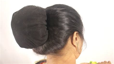 Traditional Net Hair Bun Secured Net Hair Bun Bun Hairstyle With Net