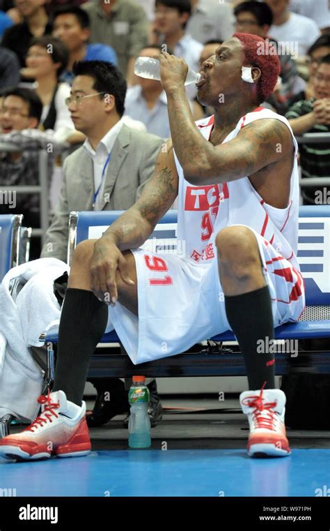 Former Nba Star Dennis Rodman Is Pictured During A Friendly Match Between American Basketball