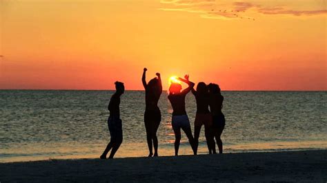 Stock Footage Young People In Silhouette Enjoying Time Together Dancing