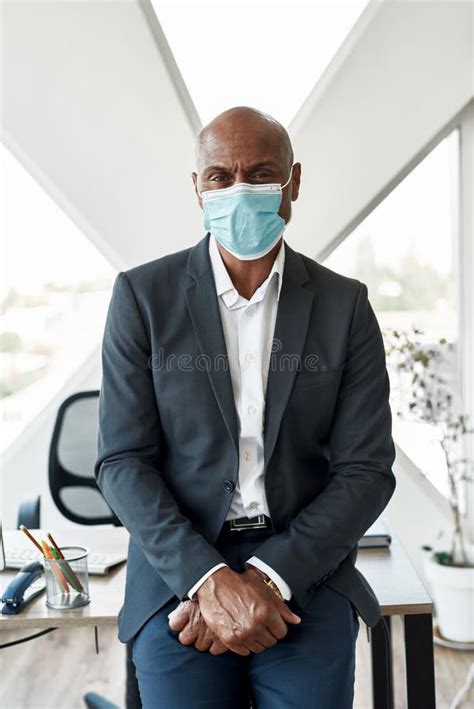 Businessman In Medical Mask Looking At Camera Stock Image Image Of