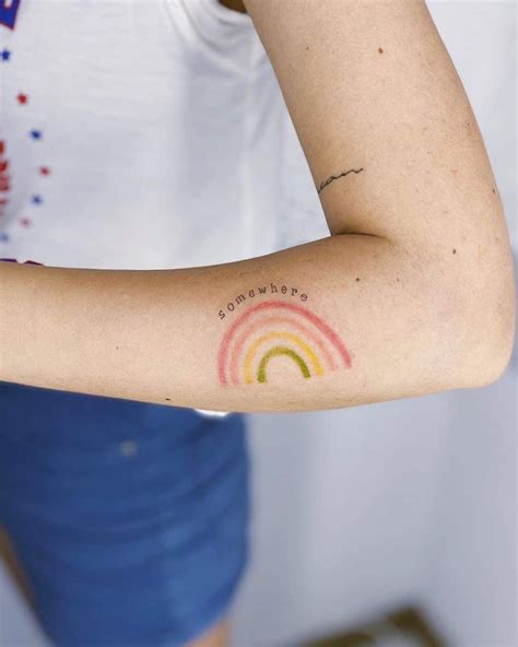23 Rainbow Tattoo Design Examples For Pride Month And Beyond Simple Arm
