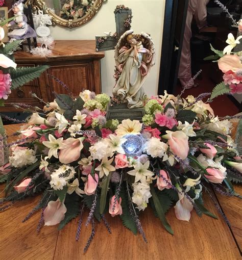 My easy tutorial for diy cemetery flowers will help you to save lots of money! Grave saddle. Memorial Day flowers for my sister. Base of ...