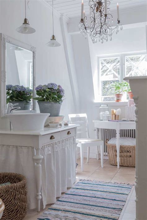 Common bathroom wall decorating ideas include mirrors, baskets, and pictures. 15 Lovely Shabby Chic Bathroom Decor Ideas
