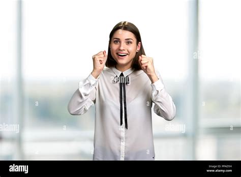 Young Excited Woman Clenched Her Fists Stock Photo Alamy