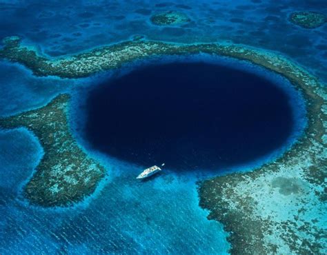 A Boat Moored At The Blue Hole Sinkhole In Belize 10 Of The Most