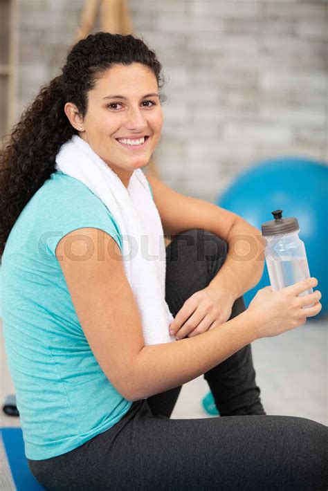 Sporty Young Woman Drinking Water In Gym Stock Image Colourbox