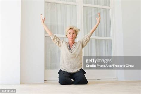 Mature Woman Kneeling Photos And Premium High Res Pictures Getty Images