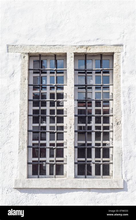 Medieval Style Window With Iron Grid Stock Photo Alamy