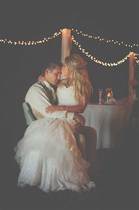 Bride Groom Wedding Day Photo Pose Kiss At The Reception Lights At
