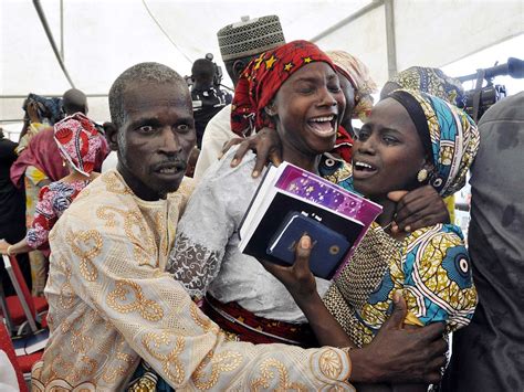 Scenes Of Joy As 21 Chibok Girls Freed From Boko Haram Are Reunited With Families The
