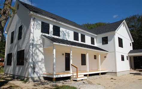 Ours is white vinyl with dark gray roof and black shutters. white vinyl siding with black windows | White vinyl siding ...