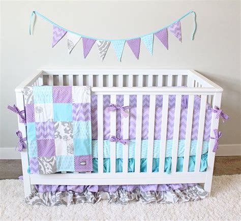 Flowers of many colors on a background of cream with butterflies and great accents is what you will find on the comforter of this great set. Girl Crib Bedding, Grey Aqua Lavender Baby Bedding, Purple ...