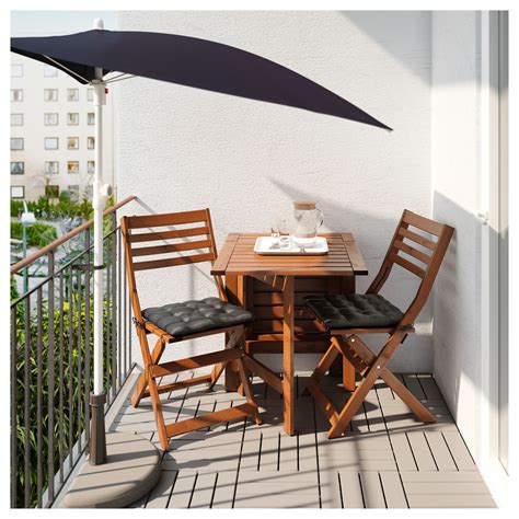 Sit and relax with a sundowner on one of the range's garden chairs , whether you're looking for hanging chairs, rocking chairs, folding chairs or even a relaxing. IKEA - FLISÖ Patio umbrella black | Ikea patio, Outdoor ...