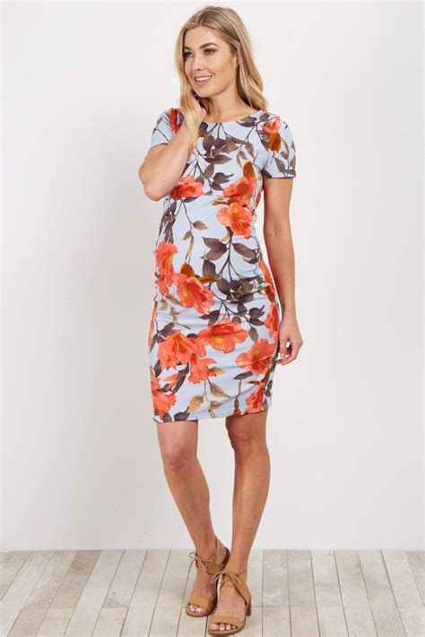 A Fitted Floral Printed Maternity Dress Rounded Neckline Ruched Sides Fitted Maternity