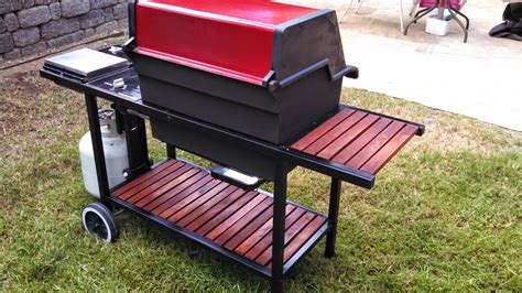 Use a clean, stainless steel bristle brush to clean the outside of the burners by brushing across the portholes, as seen in the image below. Racezilla: Weber Genesis Grill restore is Done!