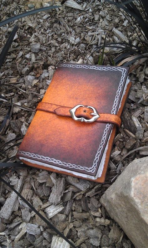Maybe you would like to learn more about one of these? Pin by Arwan on balmora | Brown silver, Leather, Grimoire
