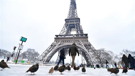 Eiffel Tower Remains Closed As Snow Freezing Rain Hits Paris The