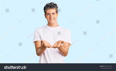 Hand Holding Tshirt Images Stock Photos Vectors Shutterstock
