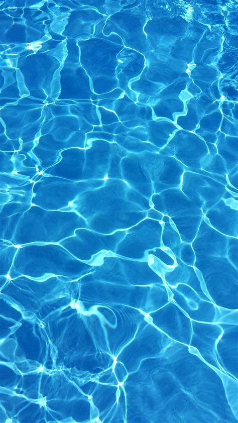 Download Deep Blue Tranquility Sparkling Pool Water Wallpaper